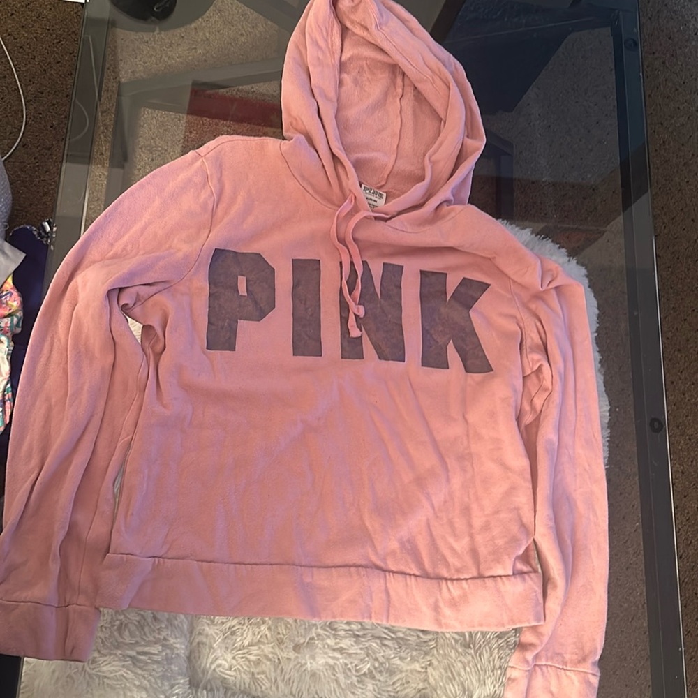 PINK slightly cropped hoodie.